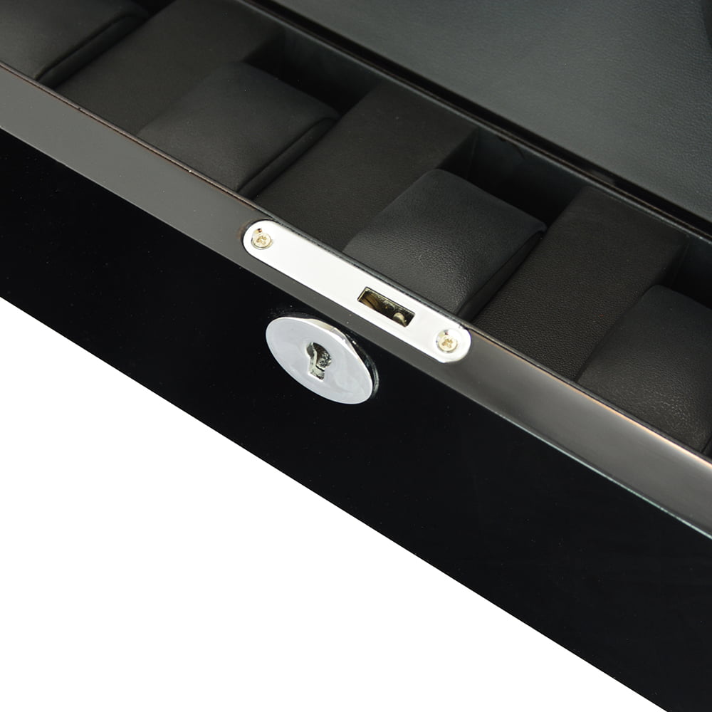 Black watch winder interior with watch storage cushions and standard hardware lock detail