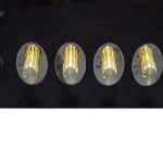 8 watch winder with four gold-tone knob controls for winding operation
