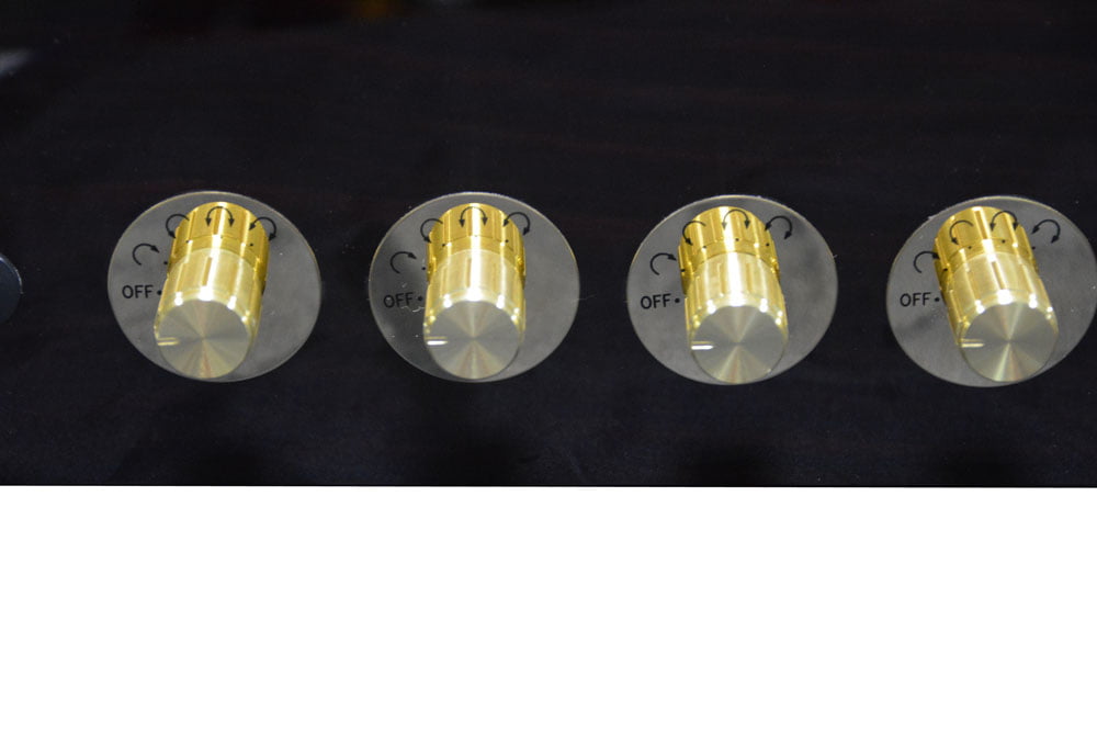 8 watch winder with four gold-tone knob controls for winding operation
