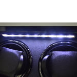 Dual watch winder interior with LED light above two black winding modules