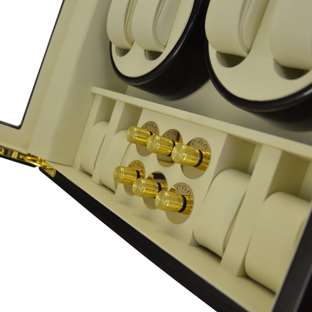12 watch winder interior showing six gold-tone knob controls and four beige watch storage positions