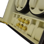 12 watch winder interior showing six gold-tone knob controls and four beige watch storage positions