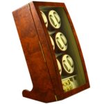 12 watch winder interior close-up showing gold-tone glass door hinge and beige PU leather-wrapped interior