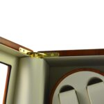 High-gloss watch winder cabinet with gold-tone hardware lock beside dual-watch winding modules
