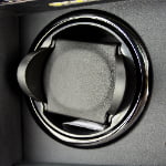 Dual watch winder close-up showing black scalable watch pillow and winding module
