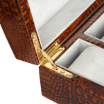 Brown crocodile grain watch display case with luxury lacquered exterior