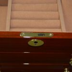 Teak jewelry case drawer bottom view with polished exterior