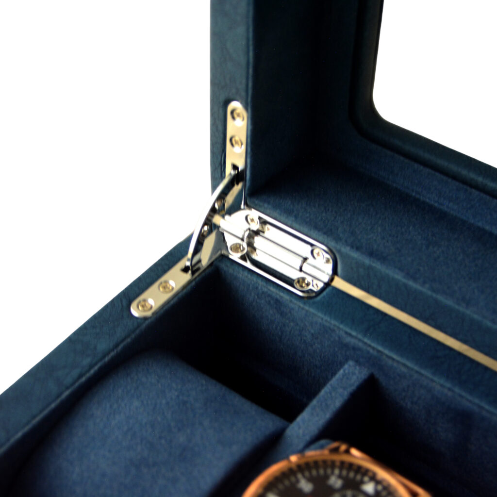 Watch box hinge hardware detail with blue velvet interior finish