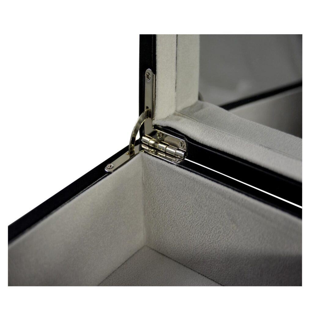 Jewelry collection box hinge detail with velvet-lined interior
