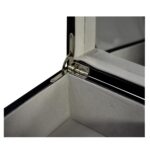 Jewelry collection box hinge detail with velvet-lined interior