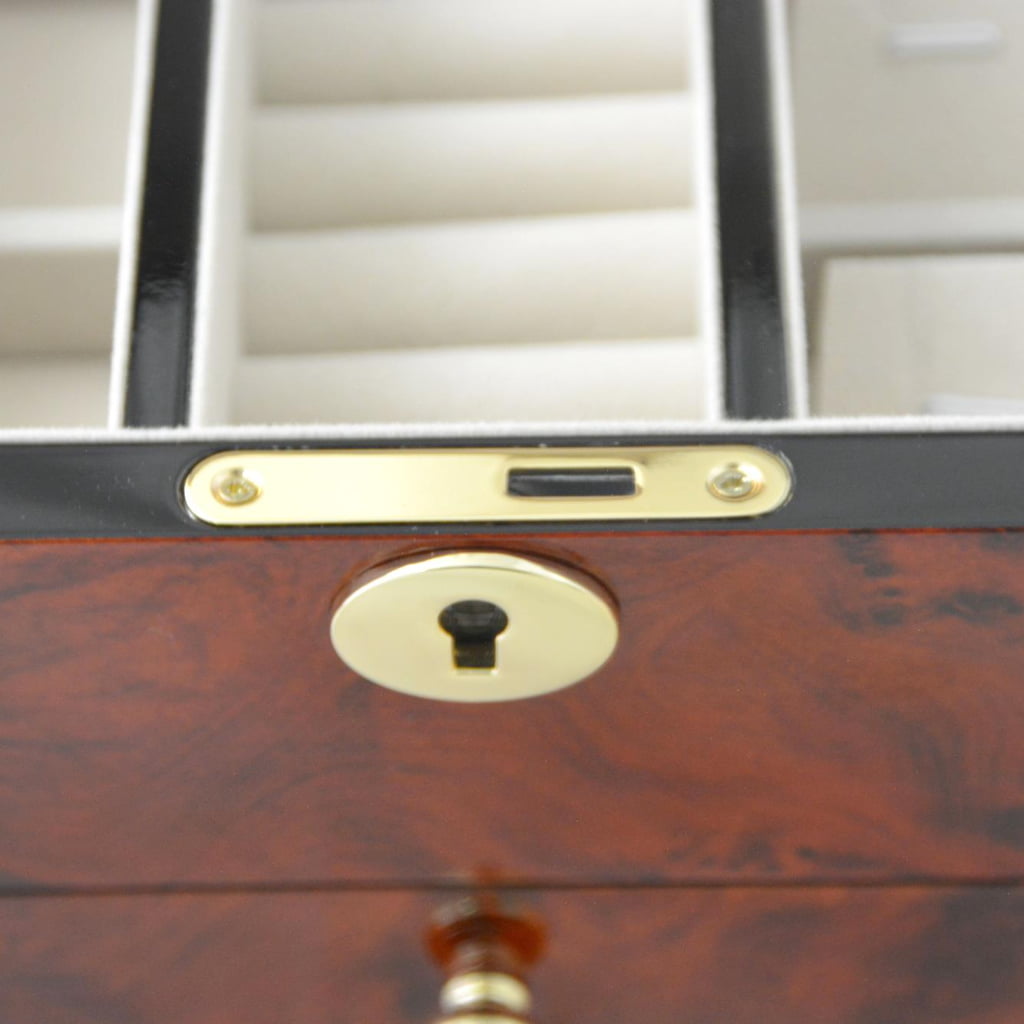 Jewelry box interior with ring rolls and earring storage panel