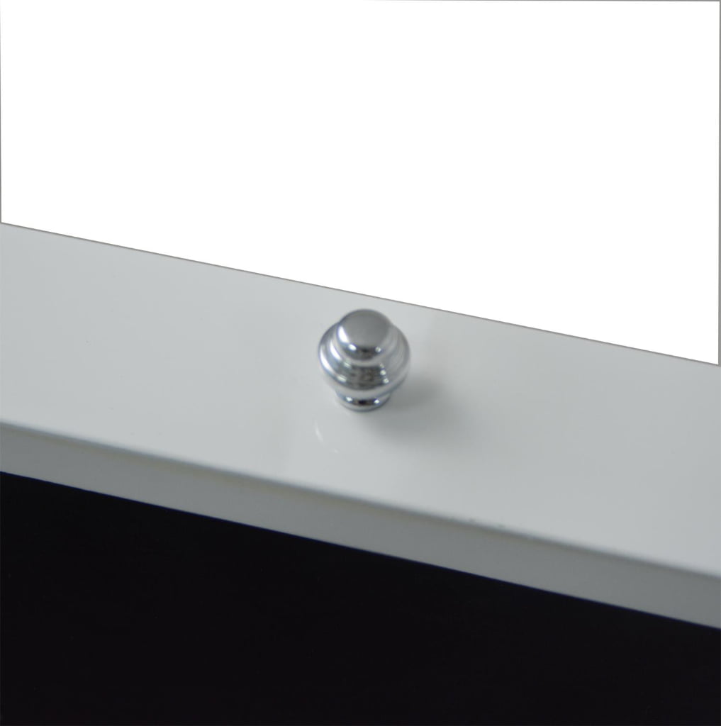 Jewelry case drawer handle detail on glossy white surface