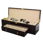 high gloss ebony 40 slot watch case with open lid and velvet watch cushions