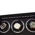 3 watch winder interior close-up with three watch holders and LED lighting