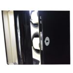 Black 3 watch winder close-up showing standard hardware lock and tempered glass door edge
