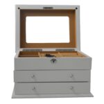 Open jewelry collection box with mirror and organized interior compartments