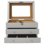 Open jewelry collection box with velvet-lined interior and storage drawers