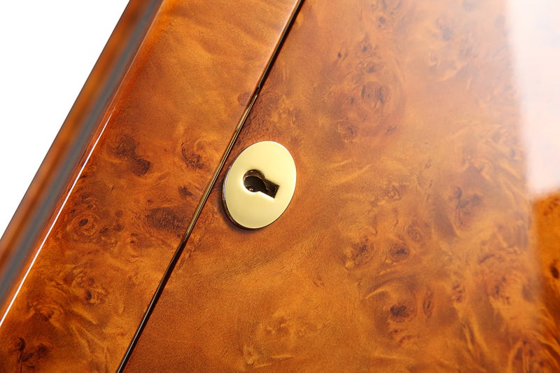 High-gloss wood finish watch winder close-up showing standard hardware lock