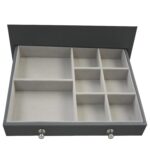 Open grey jewelry case with velvet compartments and storage sections