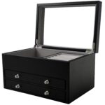Open black jewelry collection box with drawer storage and interior compartments