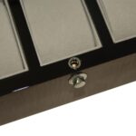 watch case front lock detail with metal hardware and glossy exterior surface