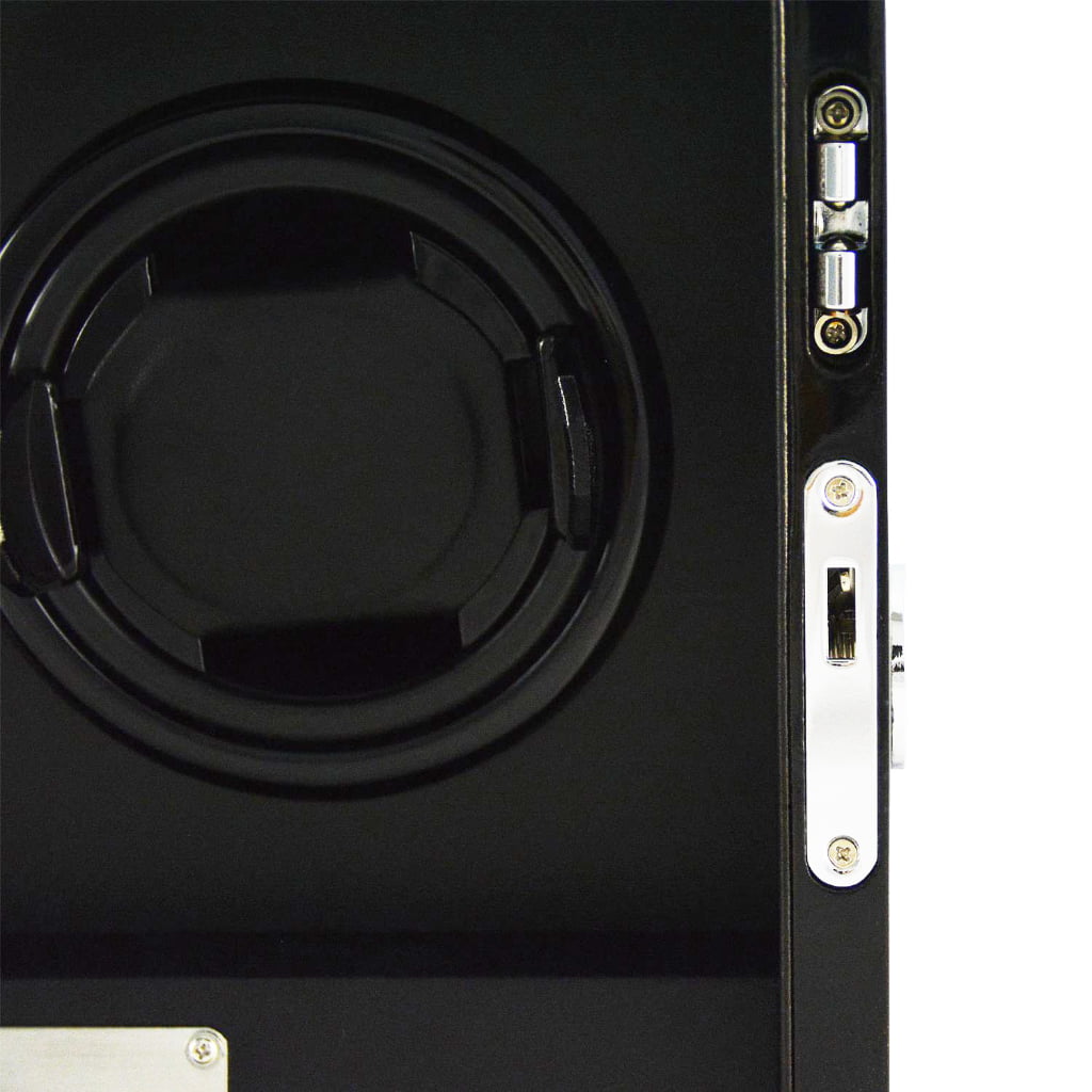 Triple watch winder interior close-up showing winding position and door lock hardware