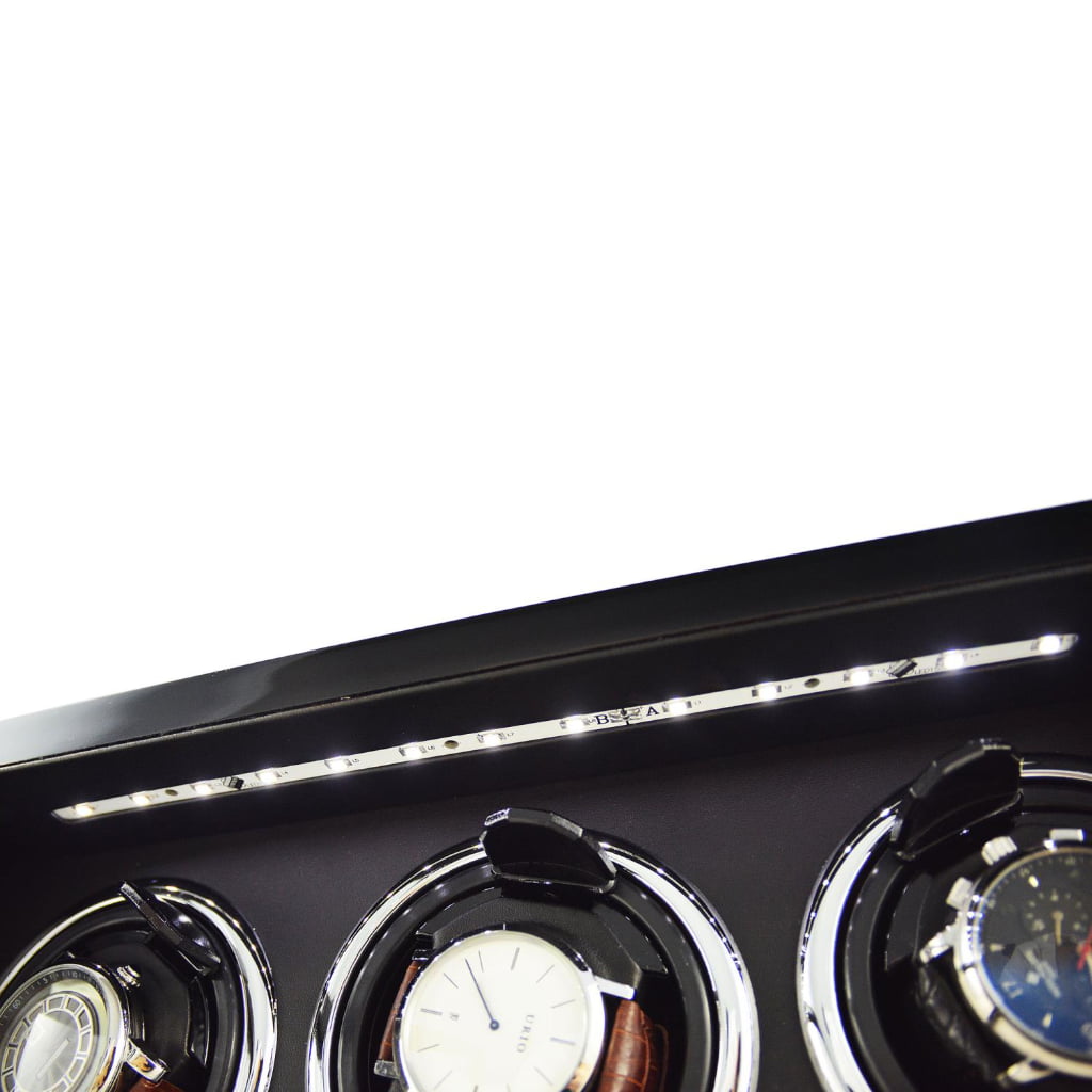 3 watch winder interior detail with LED light and black PU leather-wrapped winding area