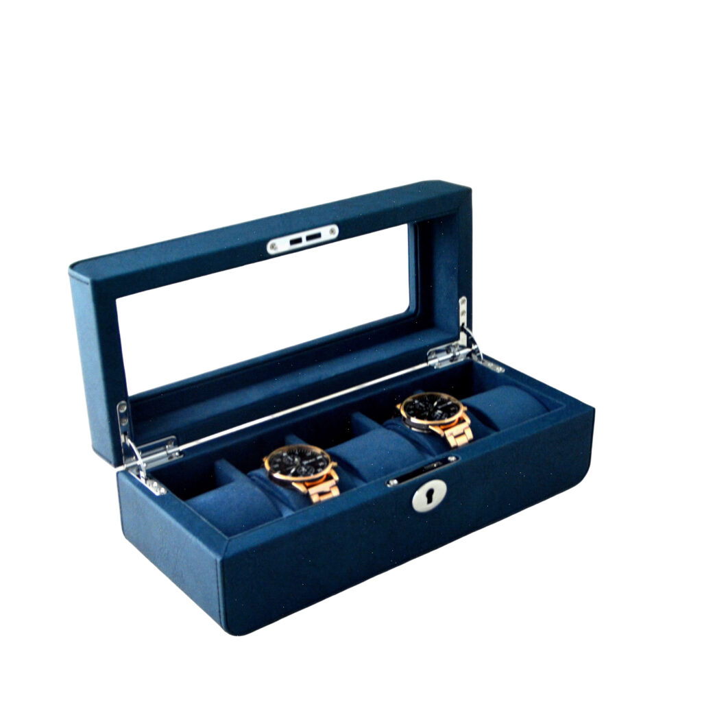 Blue watch box interior displaying watches on velvet cushions