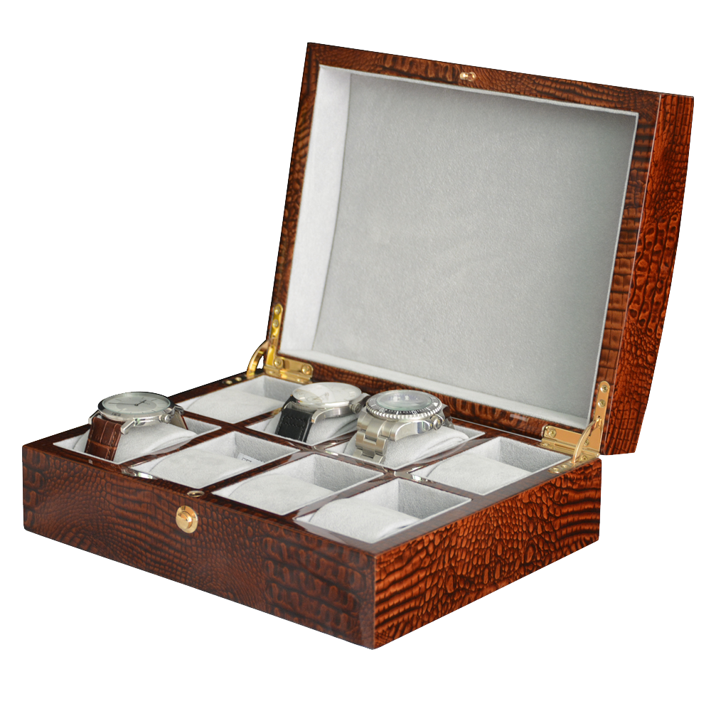 Brown crocodile grain watch case displaying automatic watches