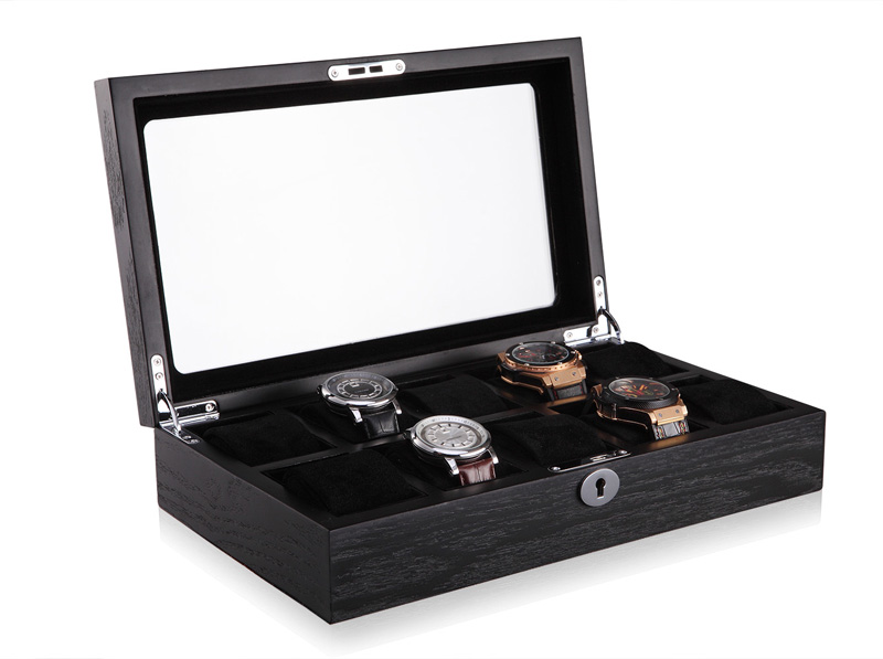 10 watch case showing watches on velvet cushions with glass display window