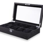 black wood watch case with multiple velvet watch compartments and display window