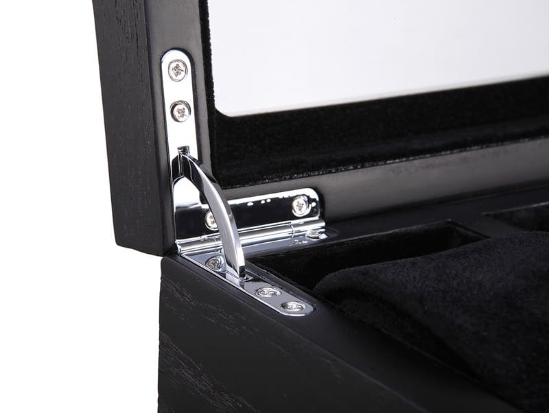 watch case metal hinge detail with black wood veneer structure