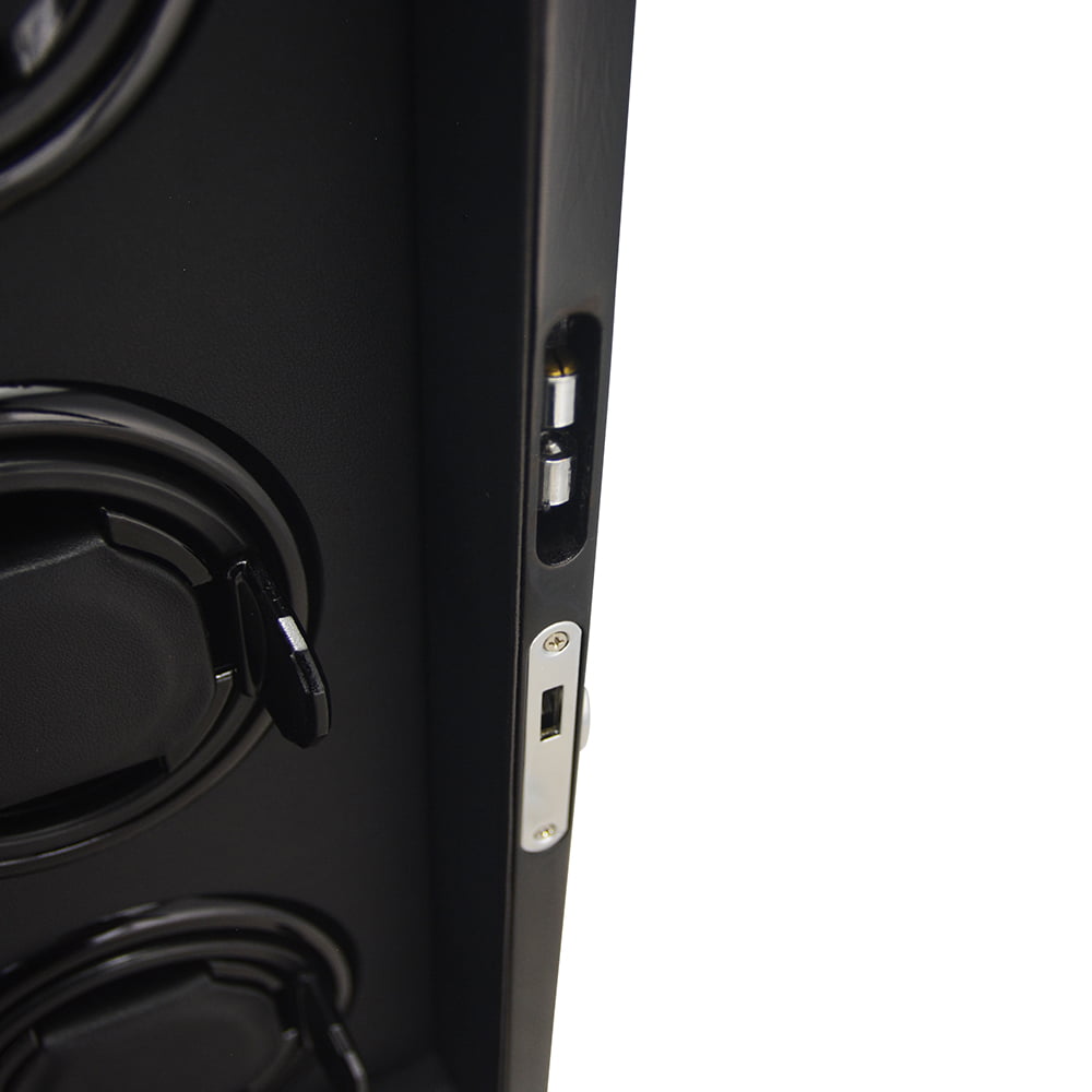 watch winder door hinge and hardware detail on black cabinet