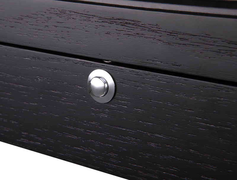 watch case snap button closure detail on black wood veneer exterior