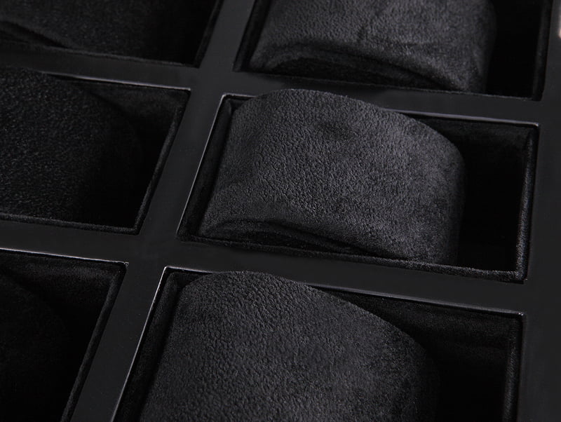 watch case hinge detail with black wood veneer structure