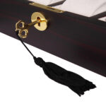 Cherry red watch case with gold-tone hardware lock and key