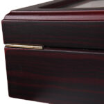 Watch case with cherry red matte lacquered exterior and rear metal hinge detail