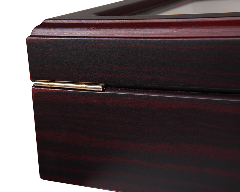 Watch case with cherry red matte lacquered exterior and rear metal hinge detail