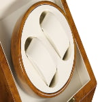 2-watch winder with two beige watch cushions and wood-grain winding drum