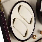 Watch winder circular module with two beige watch cushions and ebony high-gloss trim