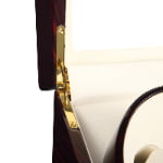 Ebony watch winder with gold-tone lid hinge and beige PU leather-wrapped interior