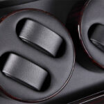 8-watch winder close-up showing black PU leather-wrapped dual watch cushions