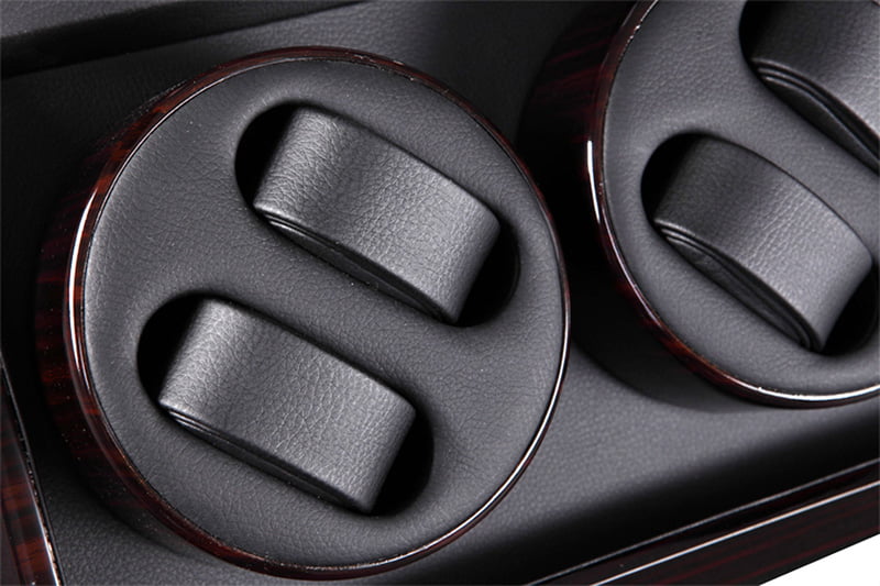 8-watch winder close-up showing black PU leather-wrapped dual watch cushions