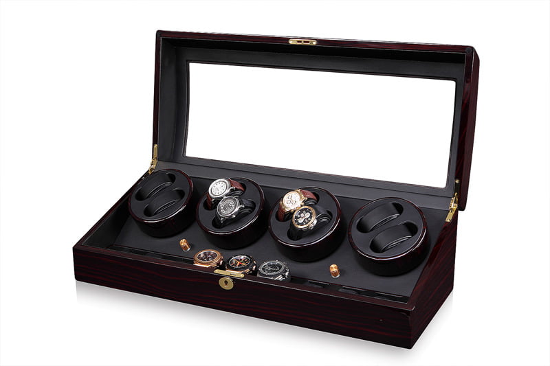Open ebony 4 watch winder displaying watches in winding modules and additional storage positions