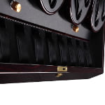 Watch winder interior with six black watch storage compartments below the winding modules