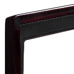 Ebony high-gloss watch winder lid corner with black trim around the display window