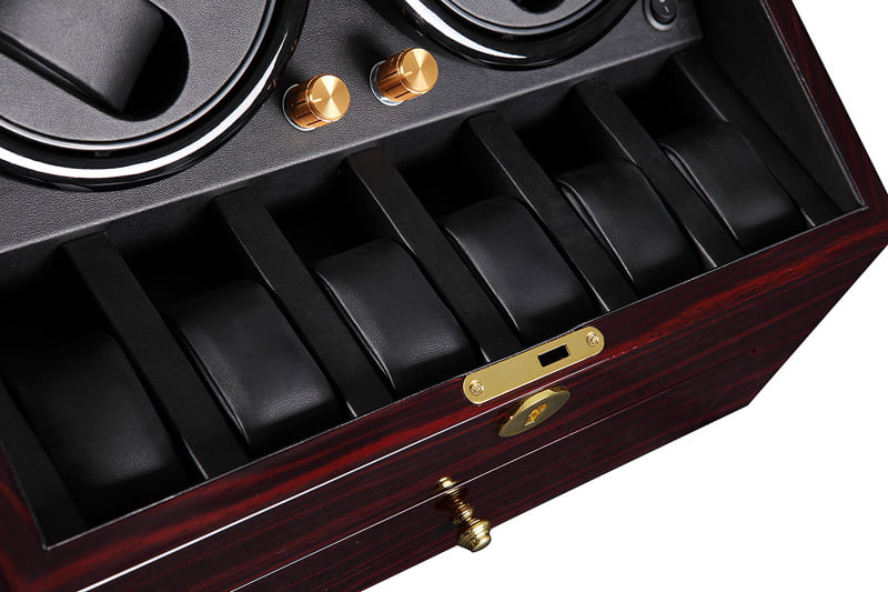 Watch winder interior with six black watch storage positions and control knobs