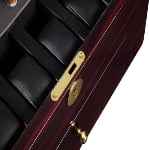 Ebony watch winder with gold-tone hardware lock and black storage interior