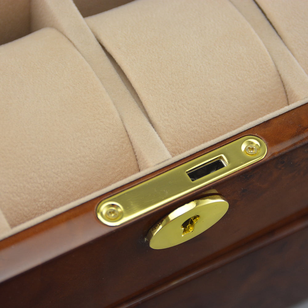 wooden watch box with velvet interior and multiple watch compartments