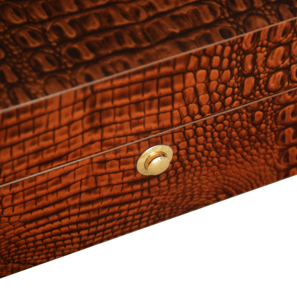 Brown crocodile grain watch case for luxury watch collection display